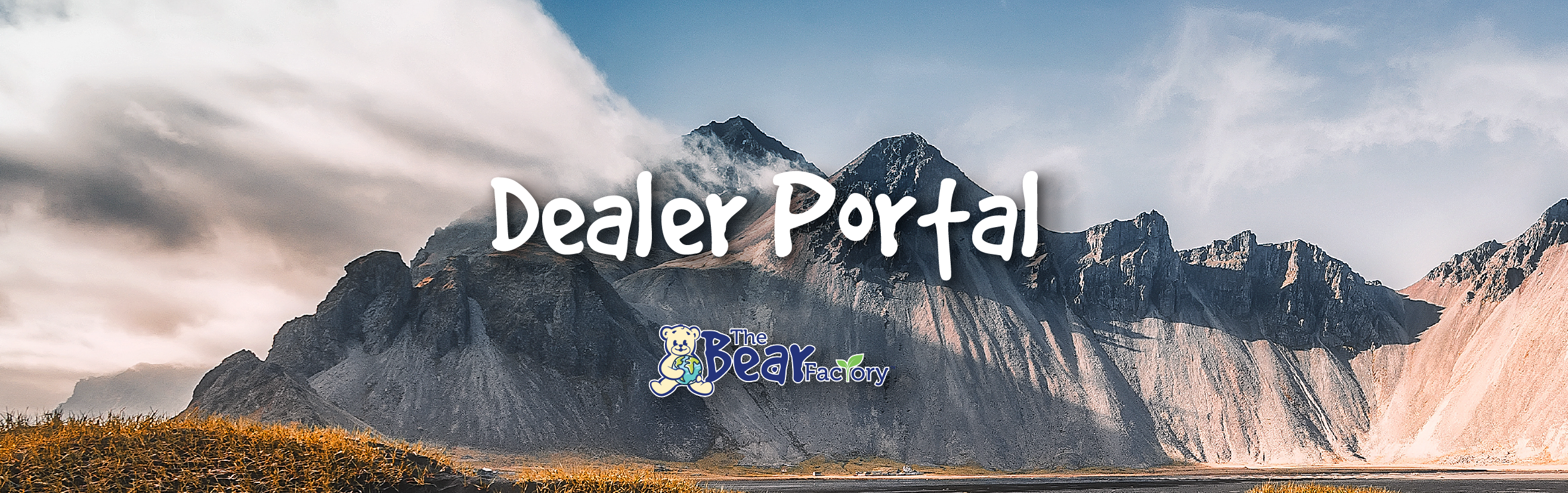 A mountain range photograph with The Bear Factory logo and the words "Dealer Portal" for certified dealers